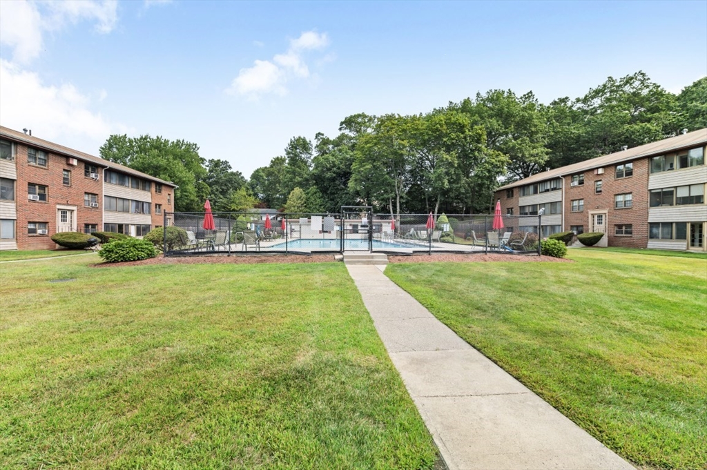 68 Preston Street, Unit 5F Wakefield, MA 01880 - Photo 16 of 20 a childrens park with lots of swings and slides