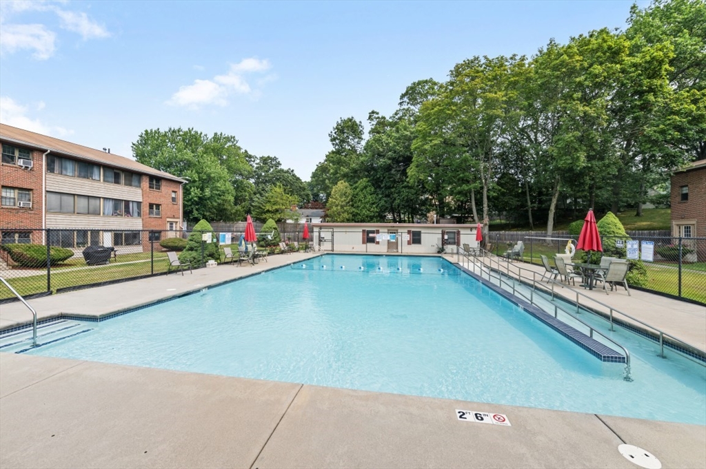 68 Preston Street, Unit 5F Wakefield, MA 01880 - Photo 17 of 20 swimming pool view with a outdoor seating space