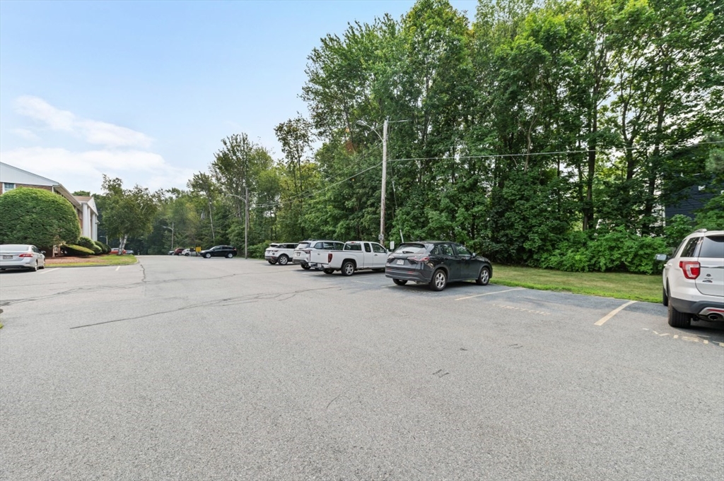 68 Preston Street, Unit 5F Wakefield, MA 01880 - Photo 19 of 20 a car parked on the side of the road
