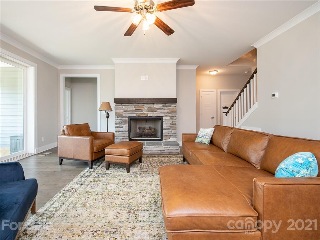763 Red Spruce Road York, SC 29745 - Photo 17 of 43 a living room with furniture and a fireplace