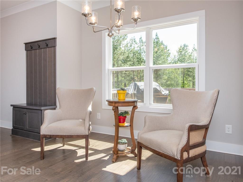 763 Red Spruce Road York, SC 29745 - Photo 20 of 43 a living room with furniture a table and a window