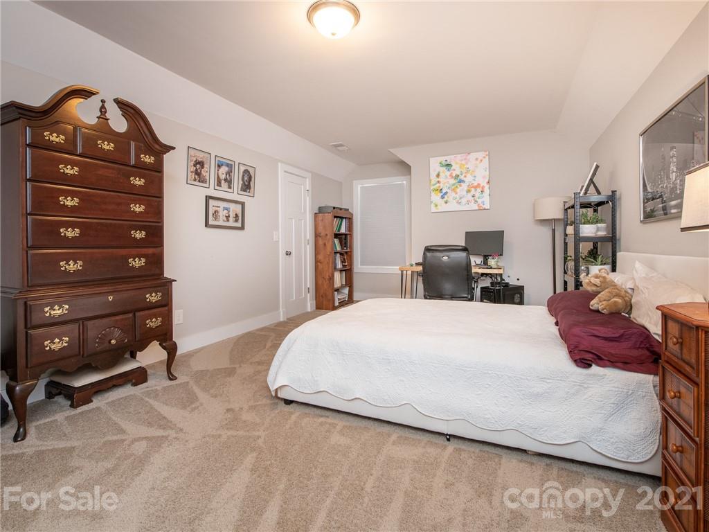763 Red Spruce Road York, SC 29745 - Photo 28 of 43 a bedroom with a bed and a television