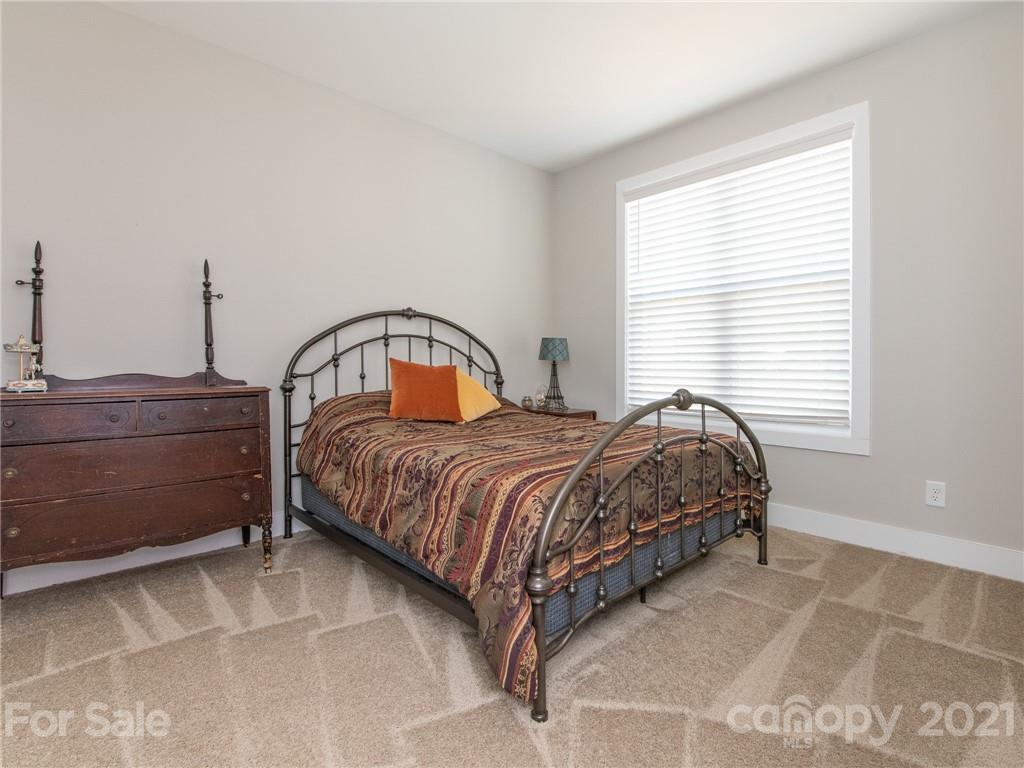 763 Red Spruce Road York, SC 29745 - Photo 30 of 43 a bedroom with a bed and with windows