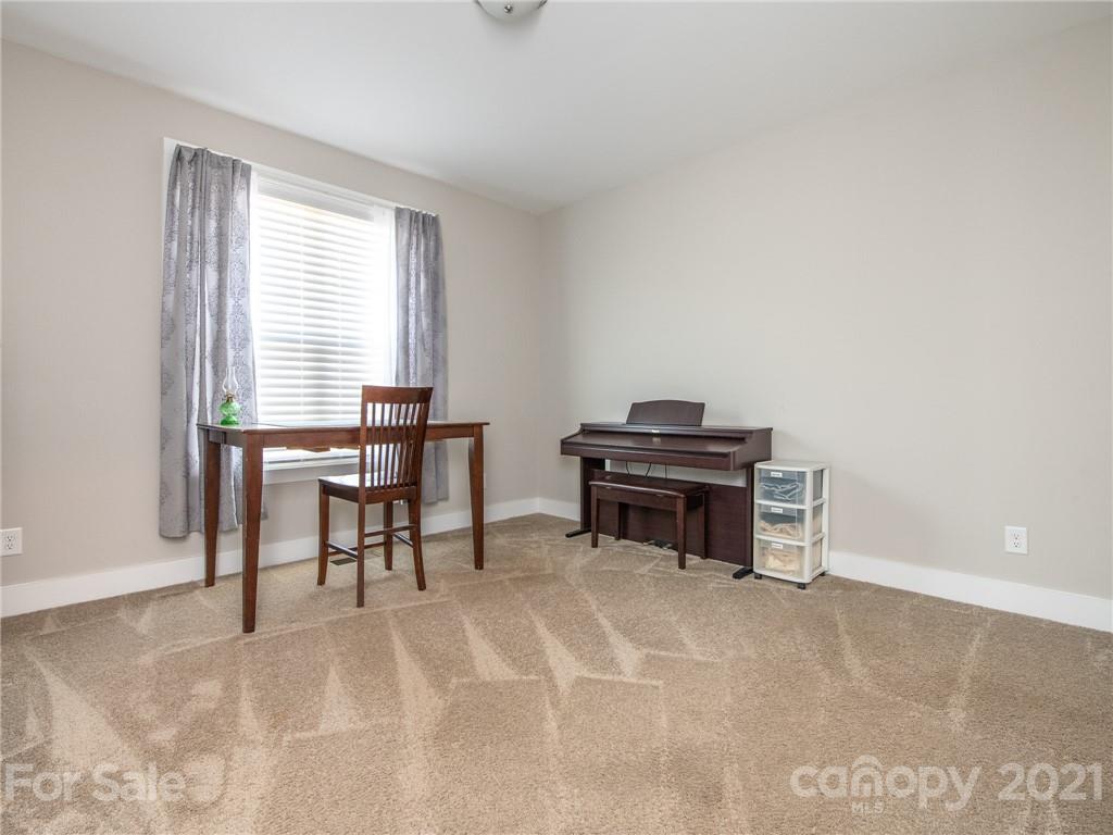 763 Red Spruce Road York, SC 29745 - Photo 31 of 43 a workspace with furniture and a piano