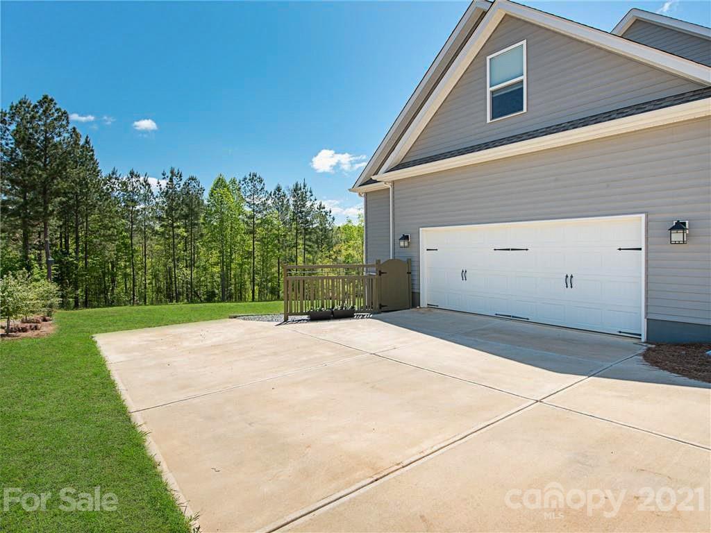 763 Red Spruce Road York, SC 29745 - Photo 32 of 43 a view of garage and yard