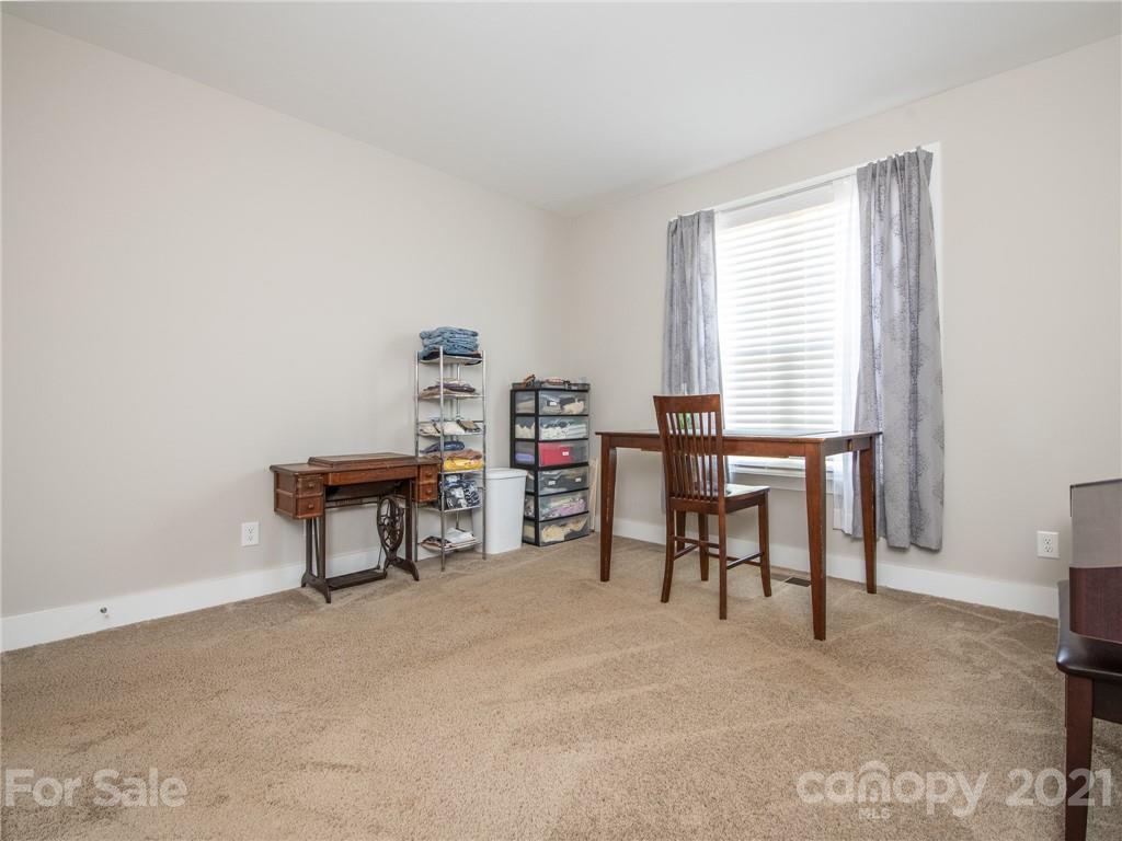 763 Red Spruce Road York, SC 29745 - Photo 7 of 43 a view of a workspace with furniture and a window