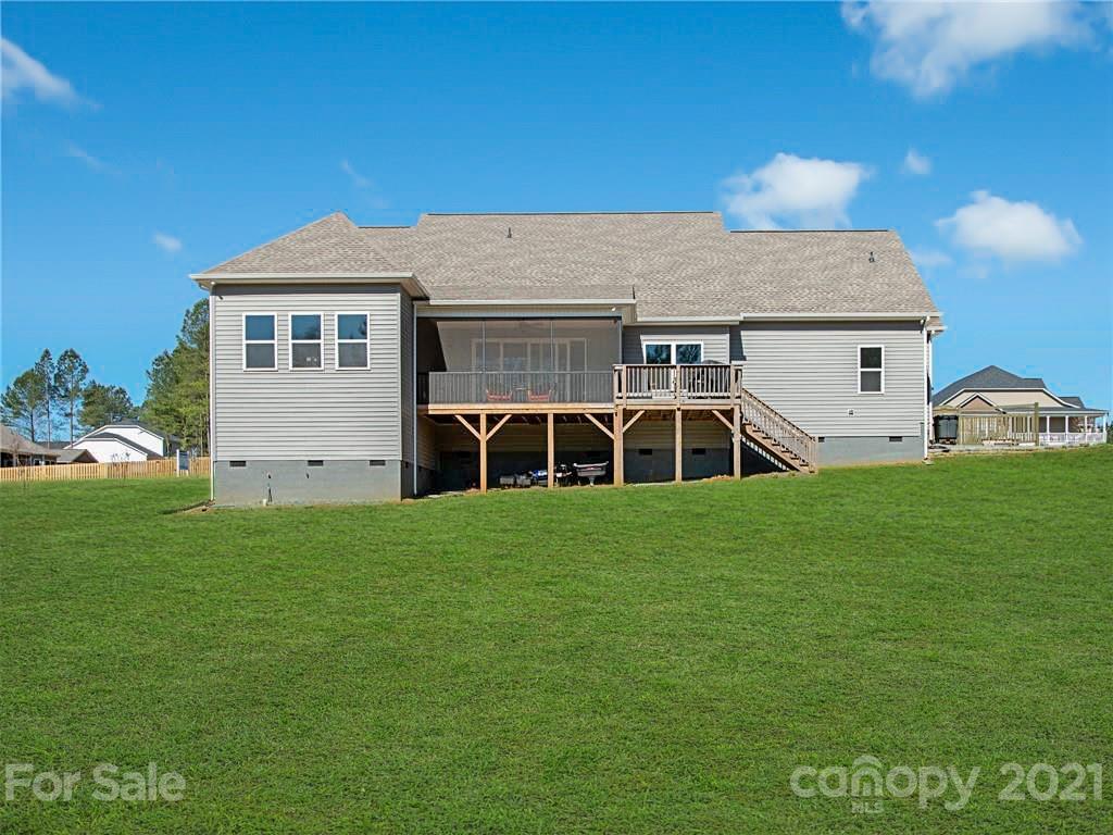 763 Red Spruce Road York, SC 29745 - Photo 9 of 43 a front view of a house with a garden