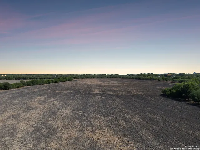 a view of an ocean and mountain