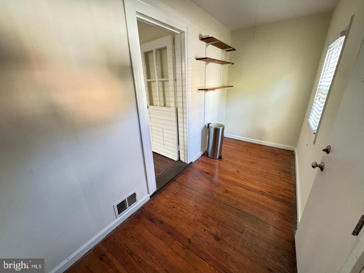60 Wiggins Street, Unit 1 Princeton, NJ 08540 - Photo 8 of 10 a view of a hallway with wooden floor and staircase