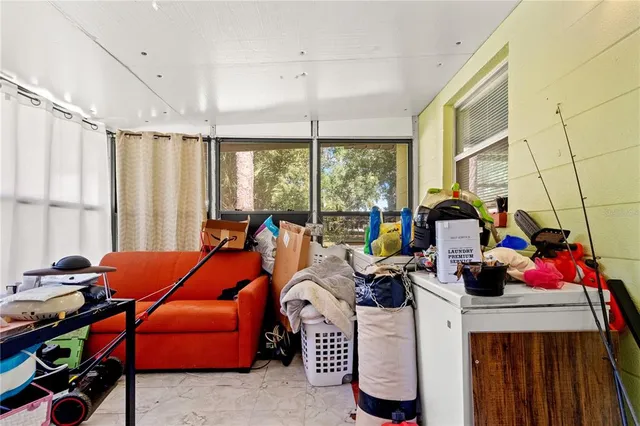 a view of a two chairs in the balcony