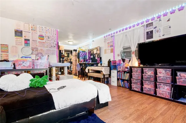 a bed room with a bed and a couch