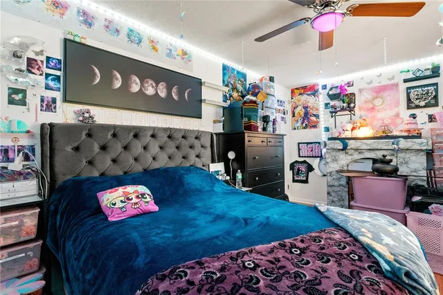 a room with lots of different furniture and a chandelier