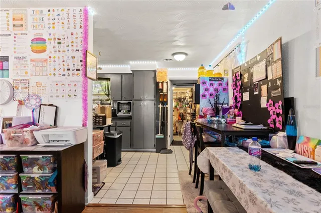 a room with furniture a rug and a window