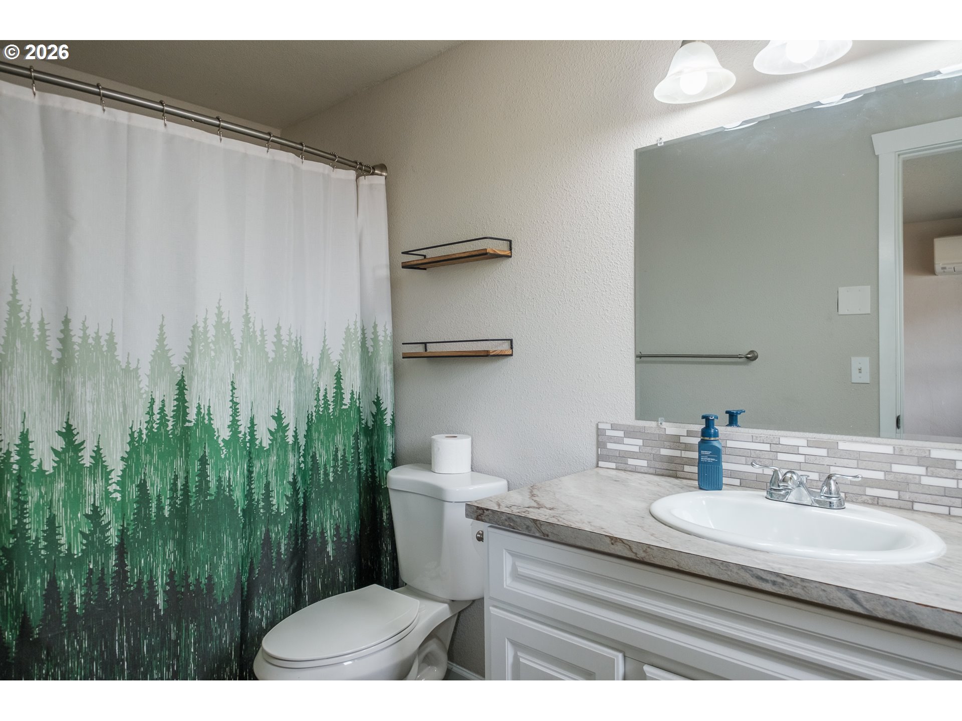 2261 Fulton Place Southeast Albany, OR 97322 - Photo 29 of 48 a bathroom with a granite countertop sink a toilet and a mirror