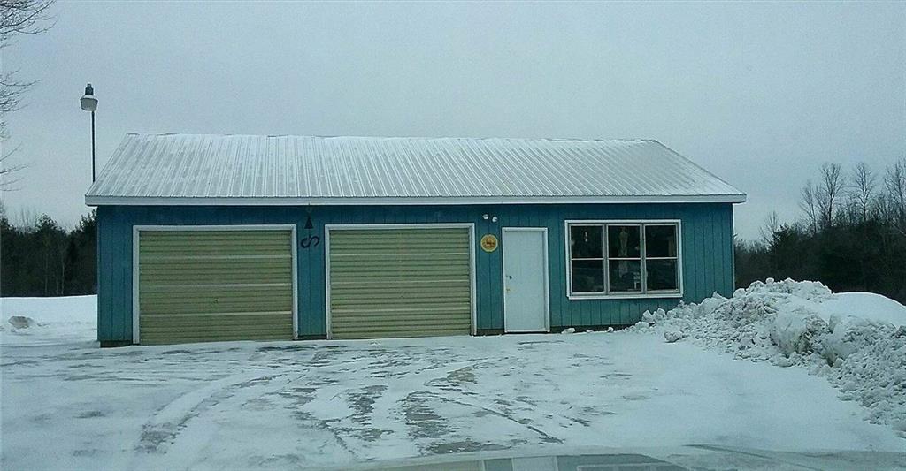 27 Neck Road China, ME 04358 - Photo 2 of 14 2-car garage with large workshop and...