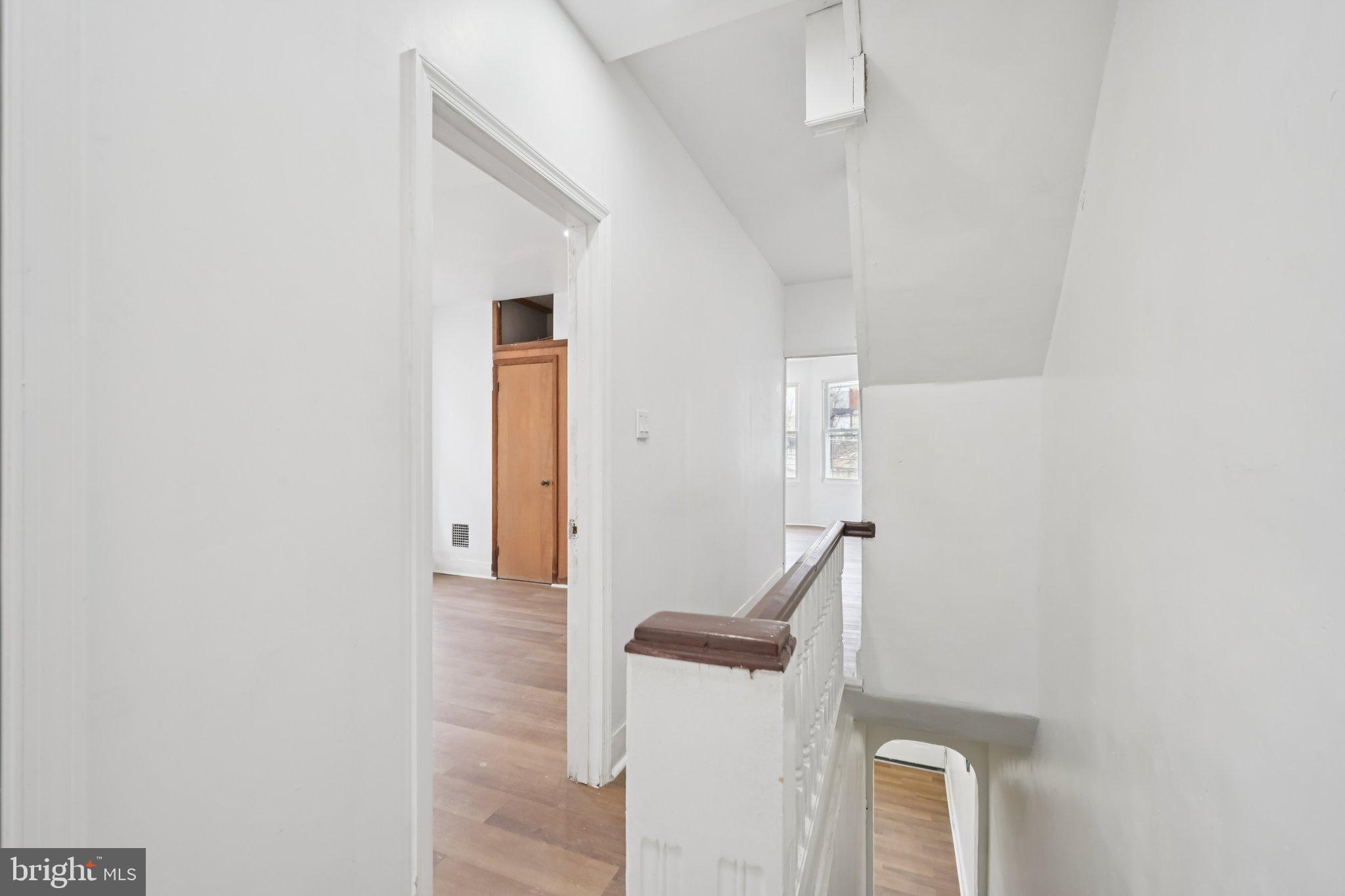 704 Main Street Darby, PA 19023 - Photo 12 of 28 a view of hallway with stairs