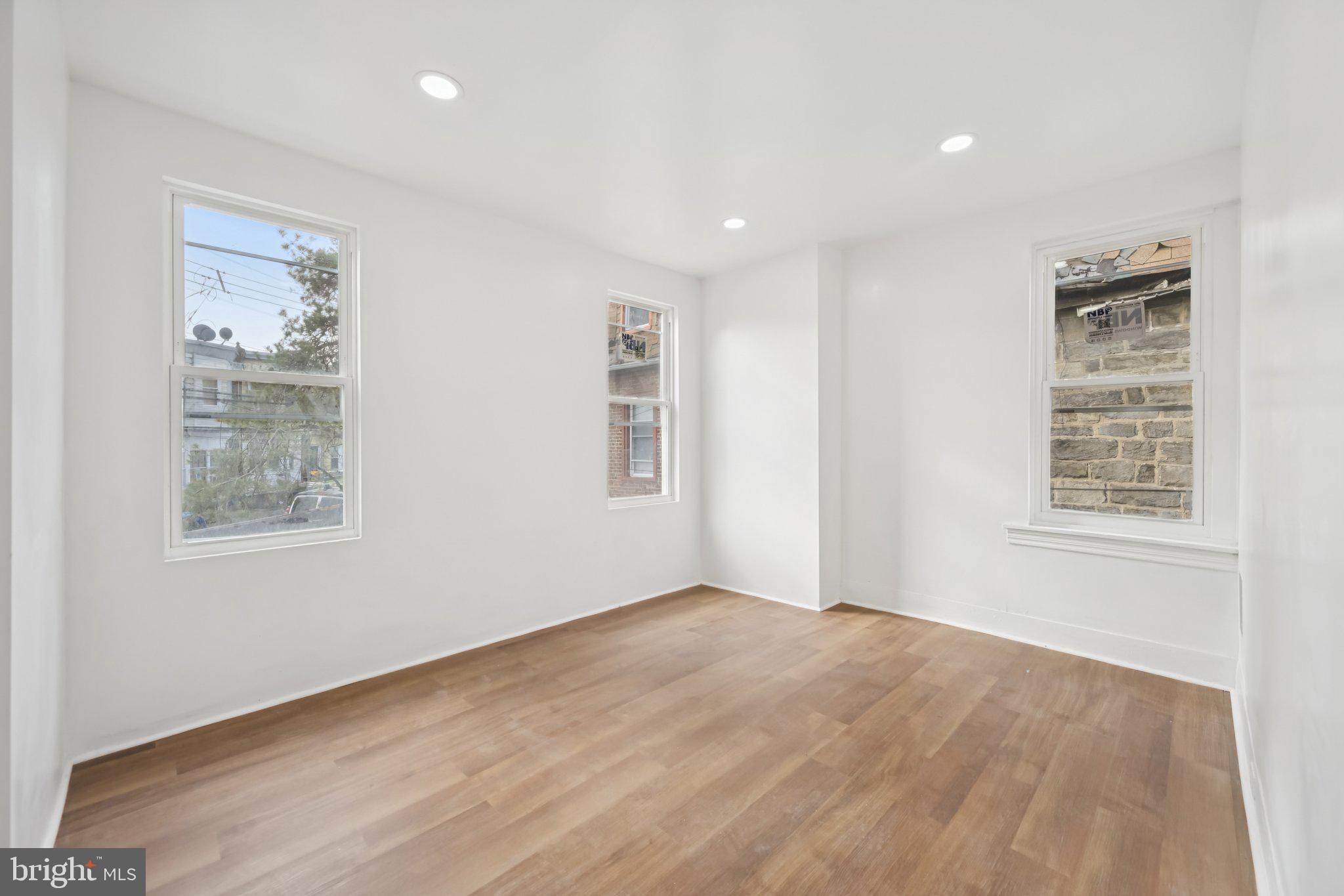 704 Main Street Darby, PA 19023 - Photo 17 of 28 a view of an empty room with a window