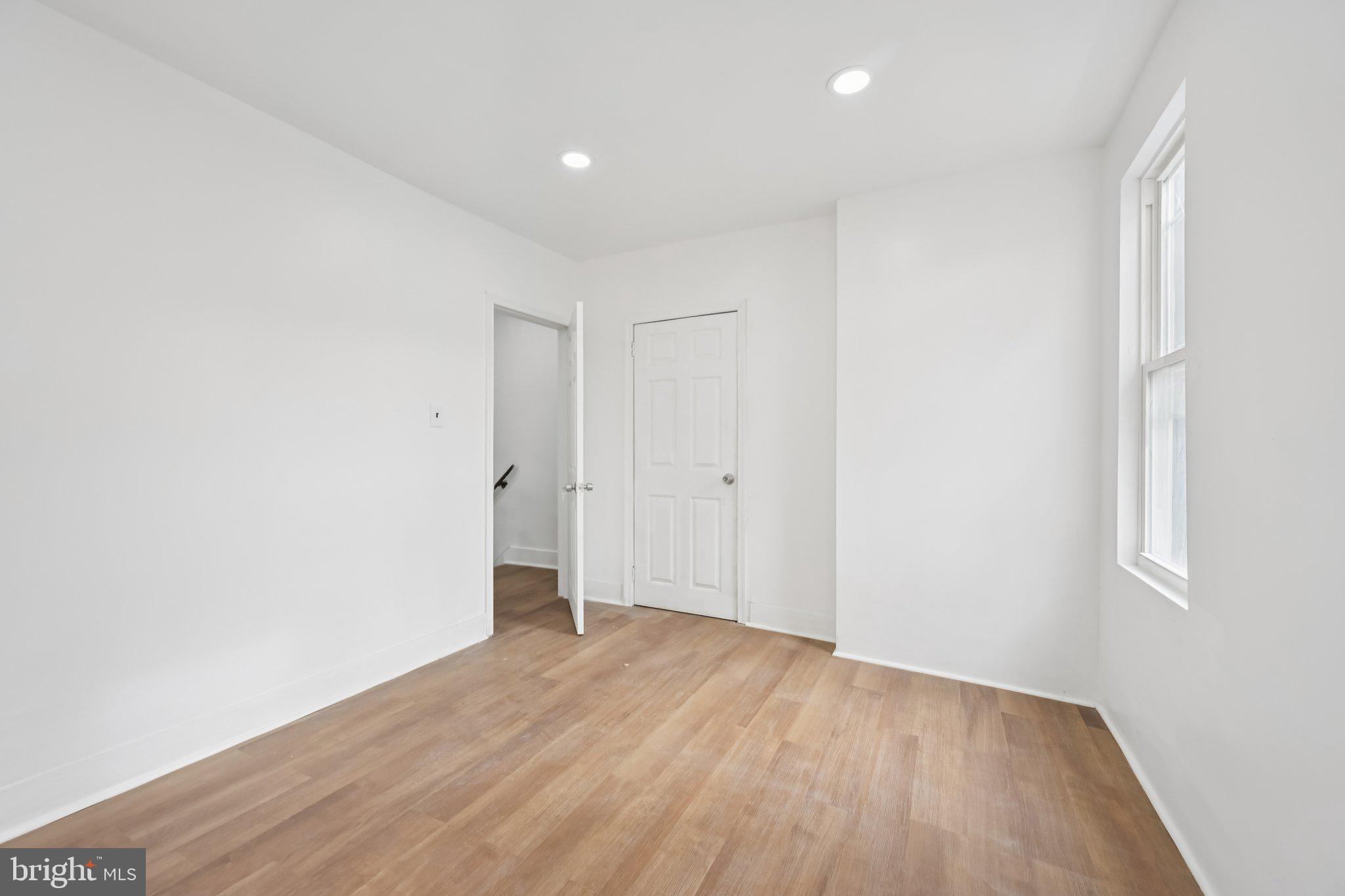 704 Main Street Darby, PA 19023 - Photo 18 of 28 a view of wooden floor in an empty room
