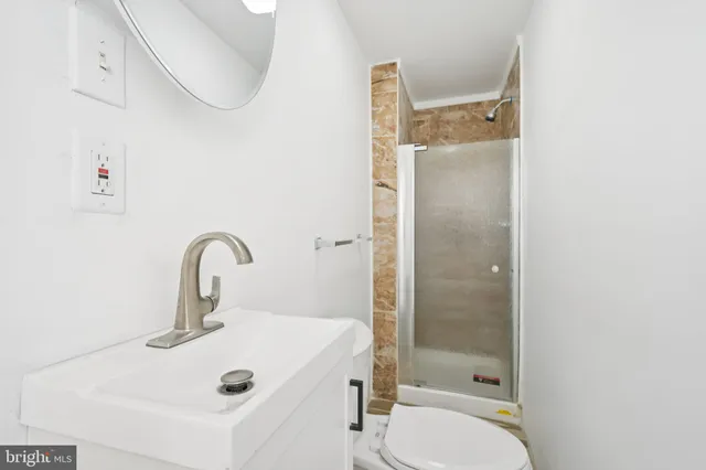 a front view of a building with a outdoor space