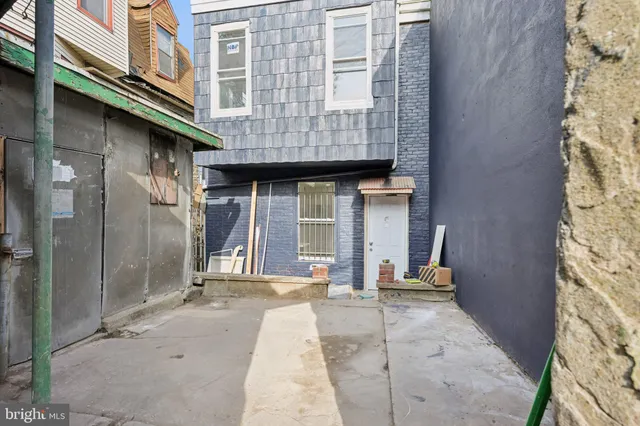 a view of a building with a street