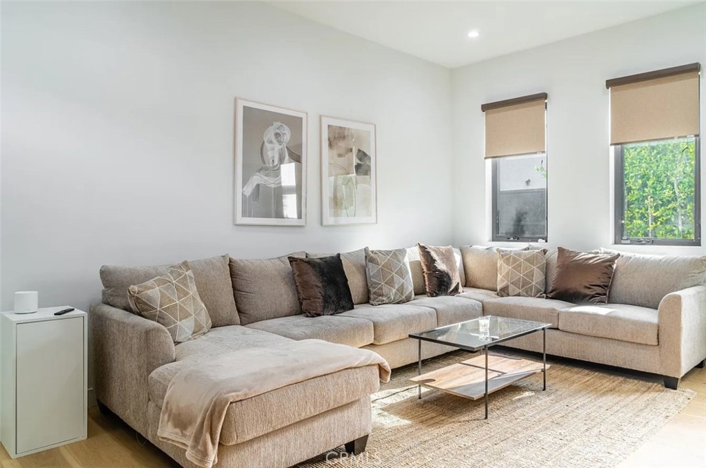 12134 Clarkson Road Los Angeles, CA 90064 - Photo 4 of 25 a living room with furniture and a couch