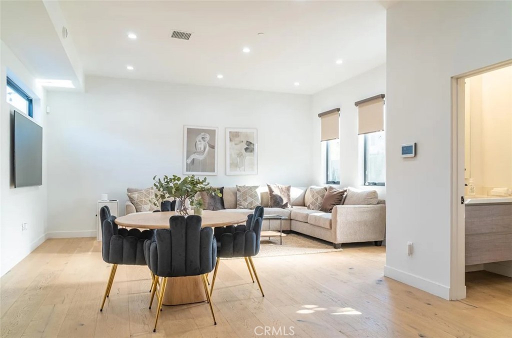 12134 Clarkson Road Los Angeles, CA 90064 - Photo 5 of 25 a living room with furniture and a large window