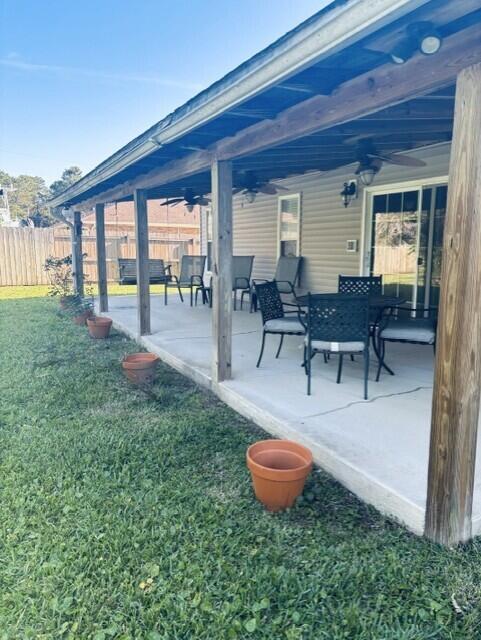 402 Juniper Street Destin, FL 32541 - Photo 19 of 20 a swimming pool with outdoor seating and yard