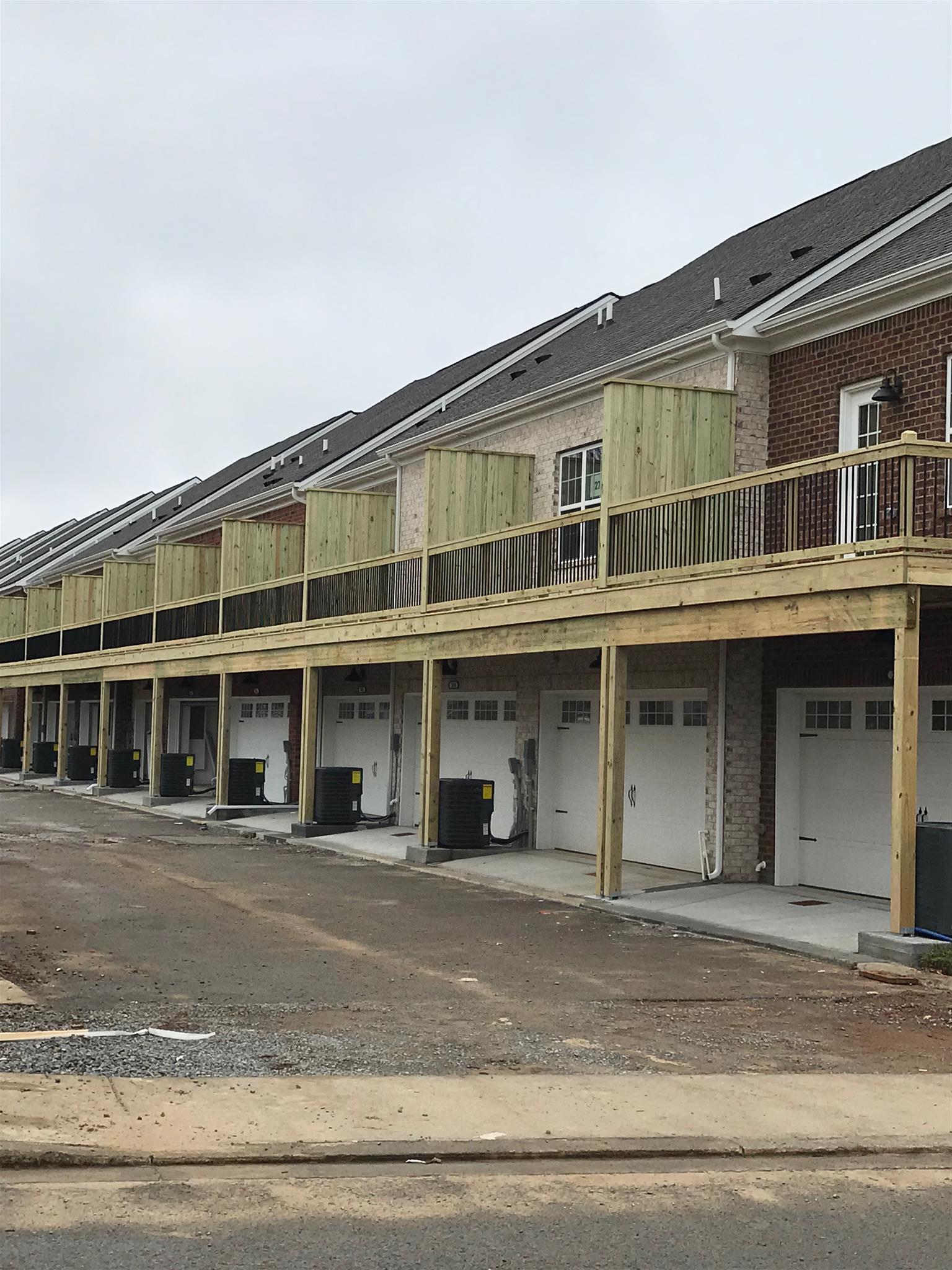 2016 Middle Tennessee Boulevard Murfreesboro, TN 37130 - Photo 2 of 21 View of privacy decks above garage. Same plan but not townhomes listed.