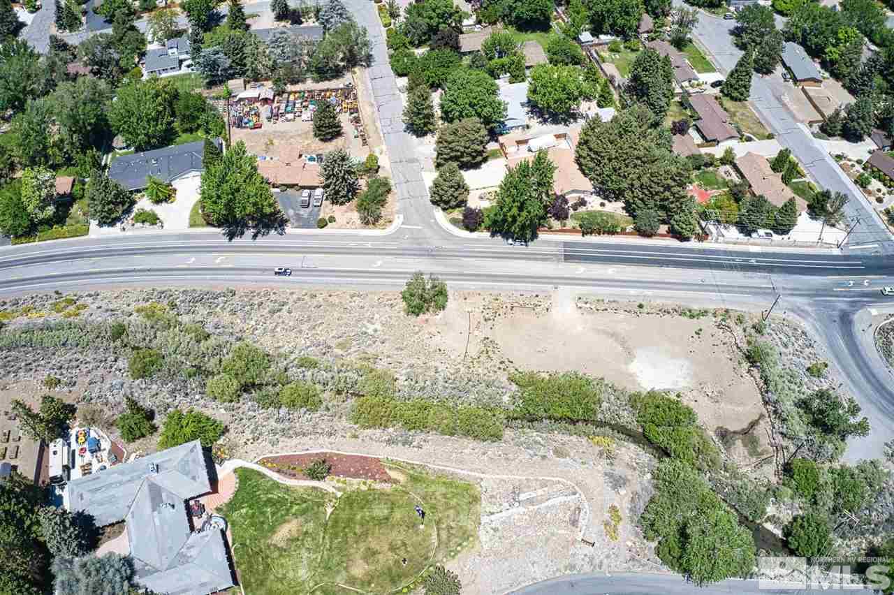 5020 Mayberry Drive Reno, NV 89519 - Photo 11 of 29 an aerial view of a house a yard and a pond