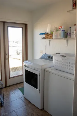 a kitchen with a stove and a sink