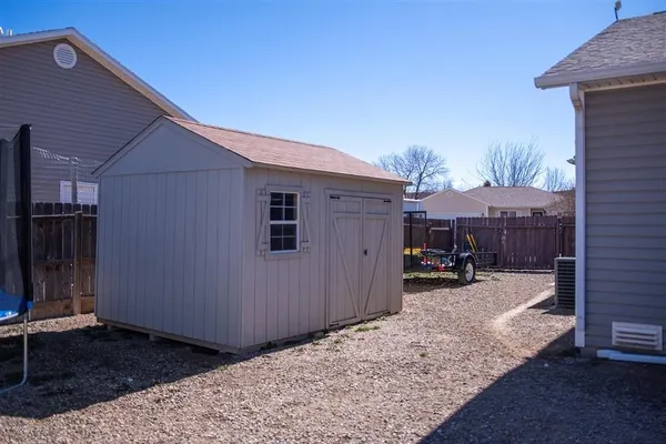 a view of a house with a patio