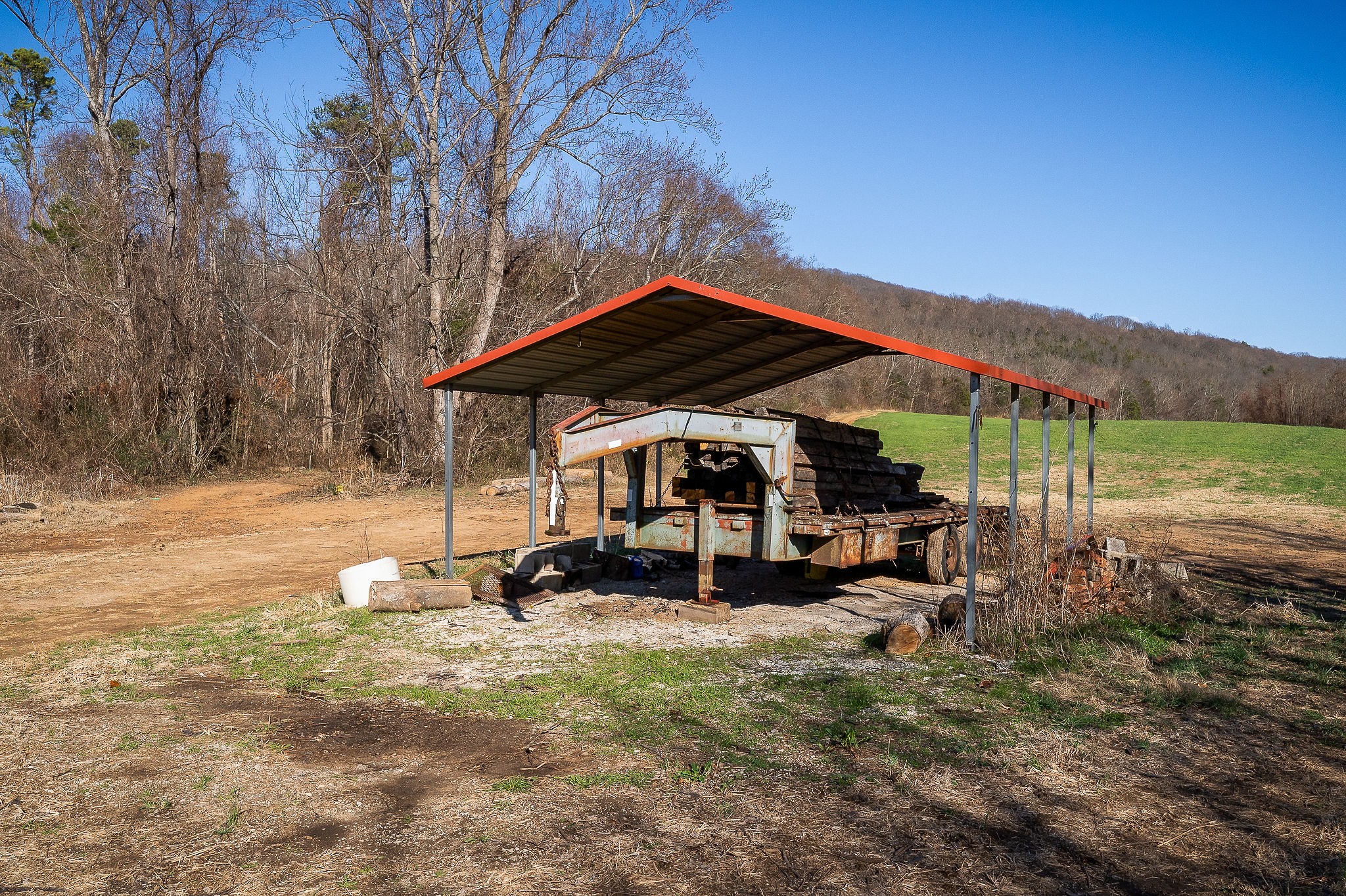 505 Thaxton Road McMinnville, TN 37110 - Photo 28 of 31 a view of a house with backyard sitting area and garden