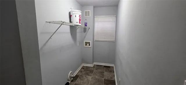 a view of a room with rack on the wall