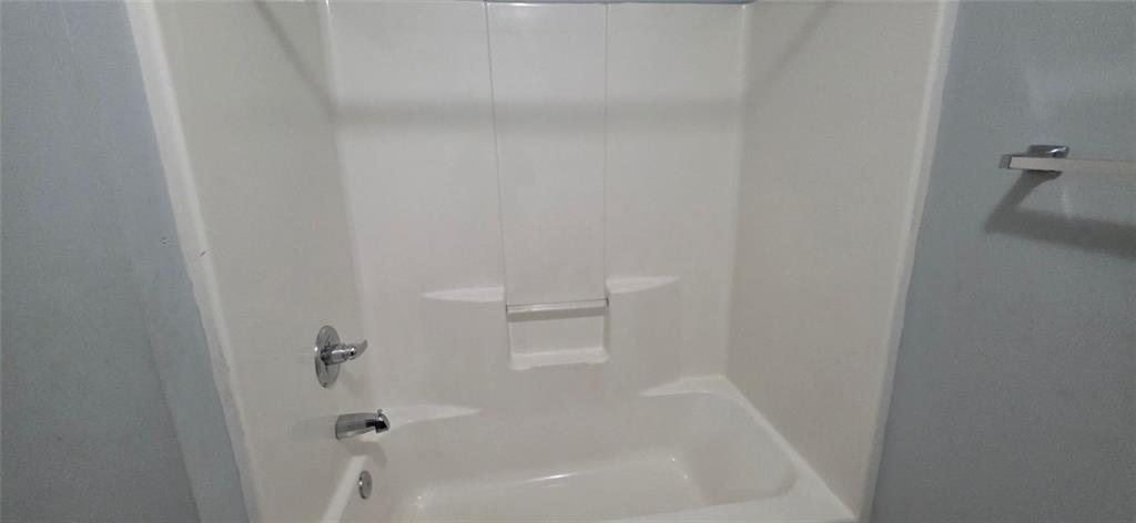 688 Smith Street Southwest Atlanta, GA 30310 - Photo 9 of 15 a close up of a bathtub