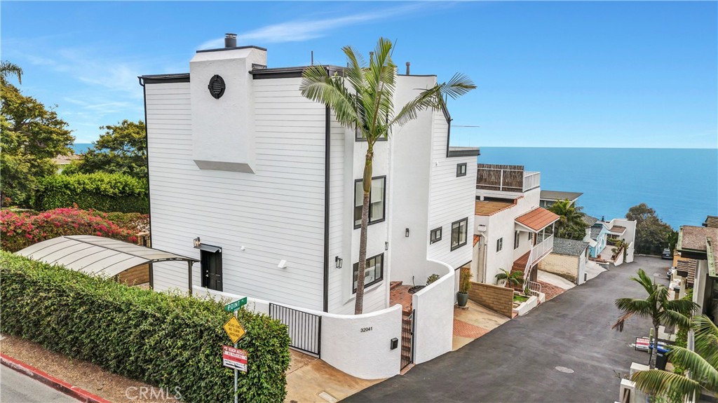 32041 Point Place Laguna Beach, CA 92651 - Photo 2 of 49 a view of a house with backyard and sitting area