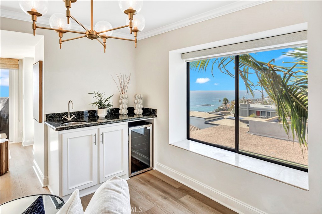 32041 Point Place Laguna Beach, CA 92651 - Photo 43 of 49 a kitchen with a sink and a refrigerator