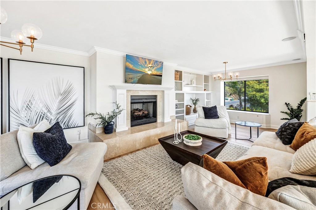 32041 Point Place Laguna Beach, CA 92651 - Photo 45 of 49 a living room with furniture and a fireplace