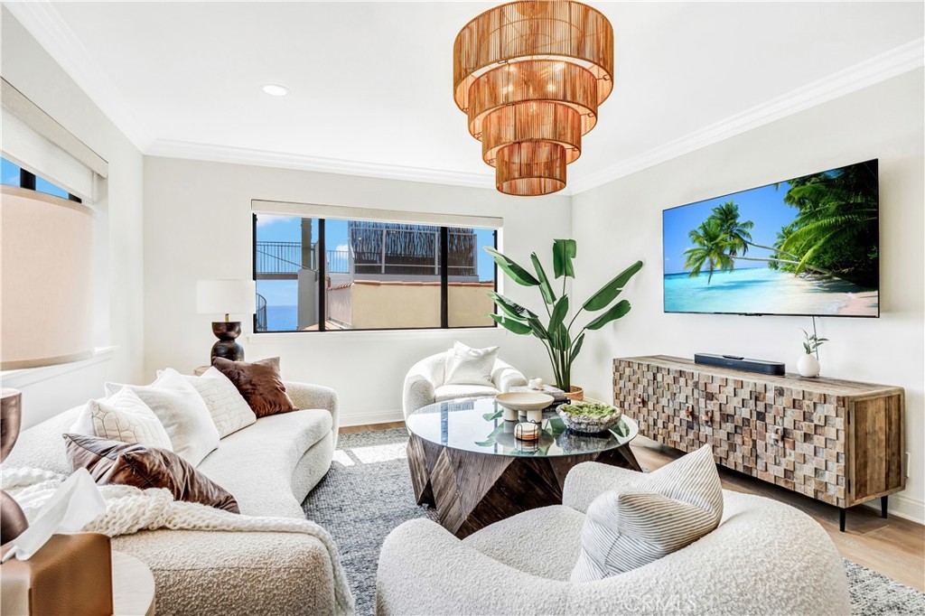 32041 Point Place Laguna Beach, CA 92651 - Photo 9 of 49 a living room with furniture chandelier and window