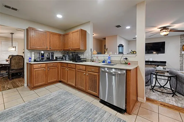 a kitchen with lots of counter top space and appliances