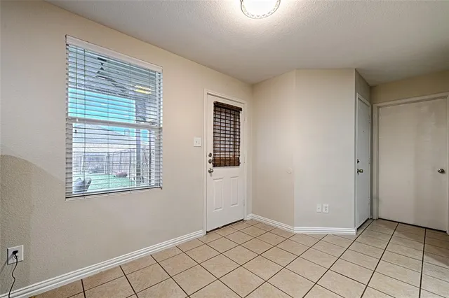 a view of an empty room with window
