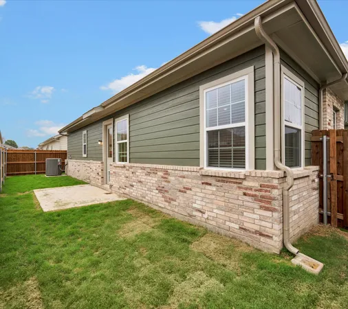 a front view of house with yard