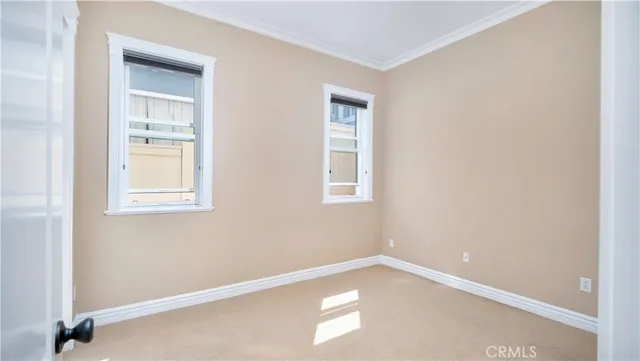 a bathroom with a sink a toilet a mirror and shower