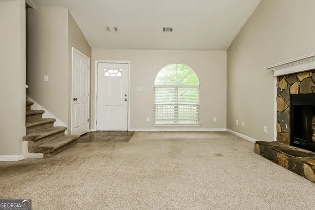 an empty room with windows