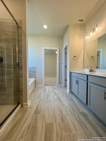 a view of an ocean beach and an outdoor seating