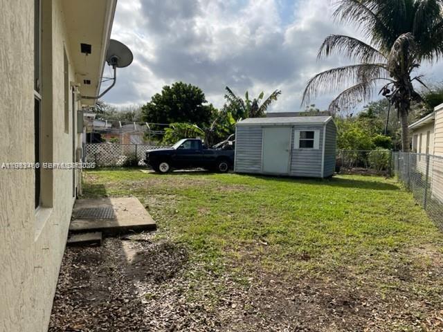 24344 Southwest 130th Place Homestead, FL 33032 - Photo 9 of 9 a front view of a house with garden