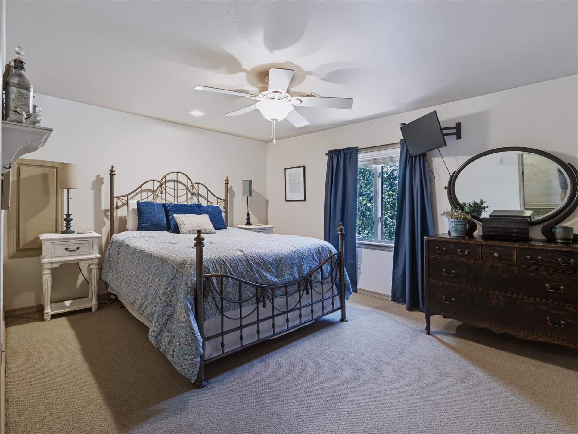 1133 West Chicken Fight Road Atoka, OK 74525 - Photo 29 of 49 Recessed lighting, ceiling fan, window, wall-mounted television bracket, and carpet flooring