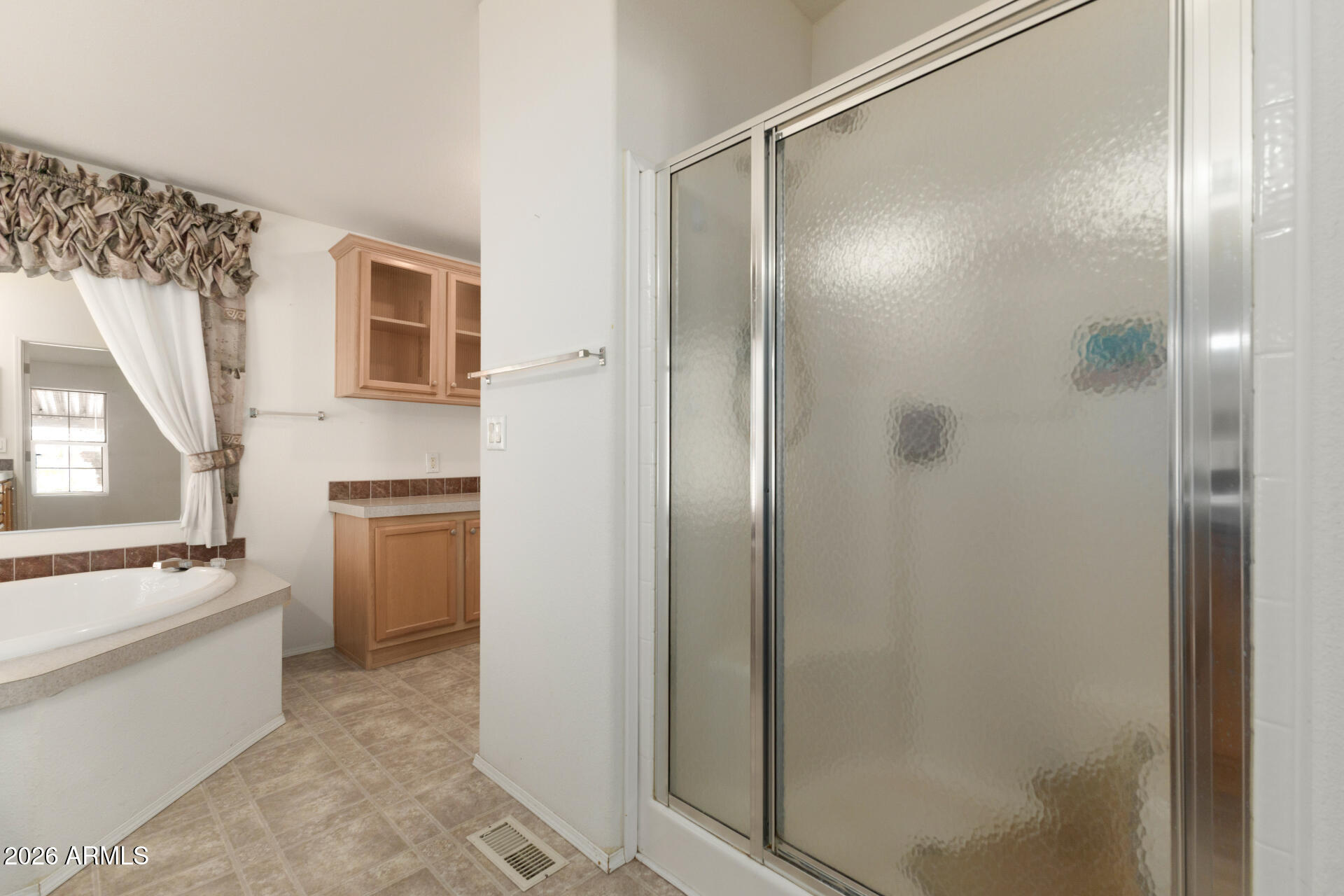 16101 North El Mirage Road, Unit 429 El Mirage, AZ 85335 - Photo 12 of 31 a kitchen with a refrigerator and a sink