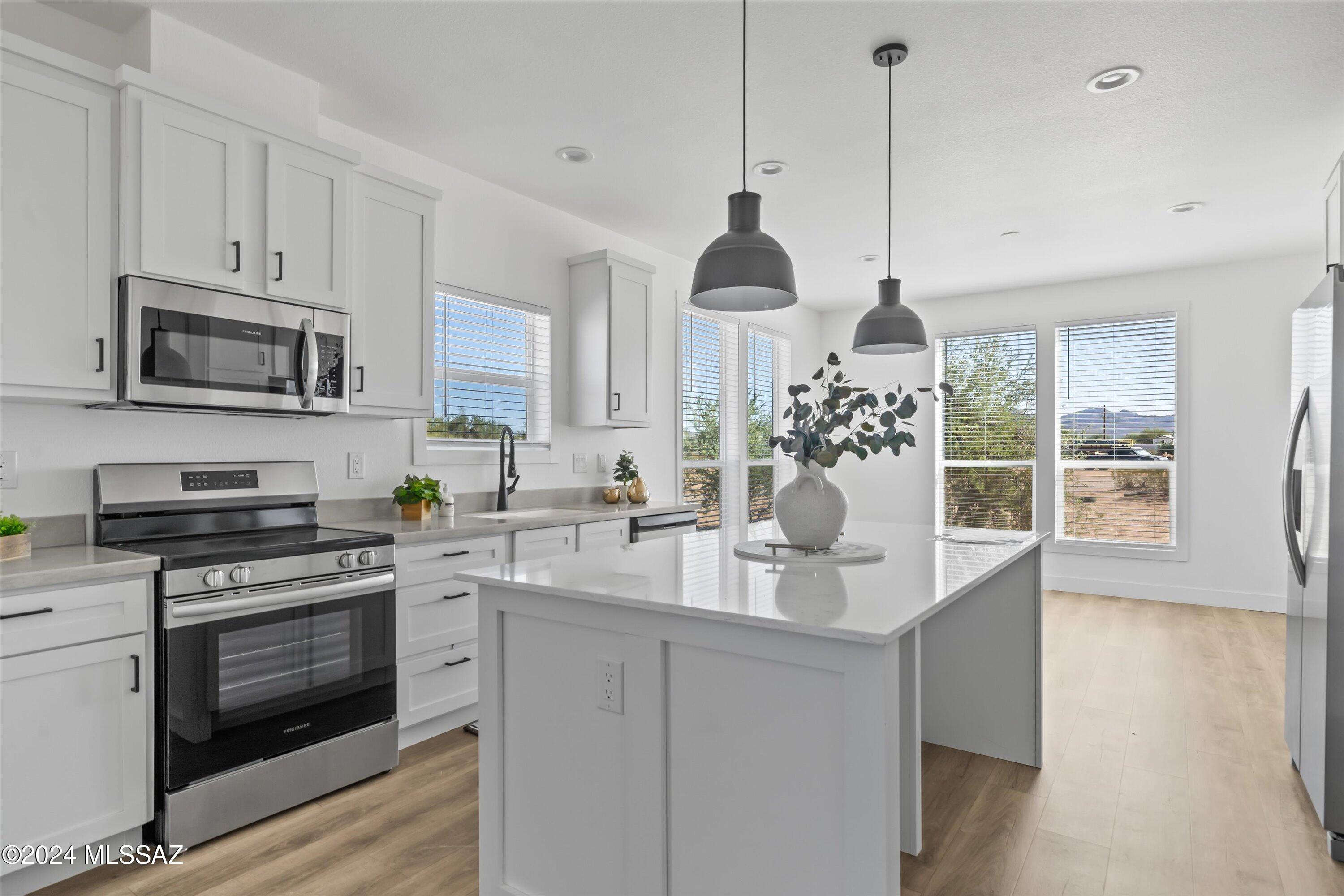 12490 West Picture Rocks Road Tucson, AZ 85743 - Photo 1 of 28 Island brkfst nook quartz counter
