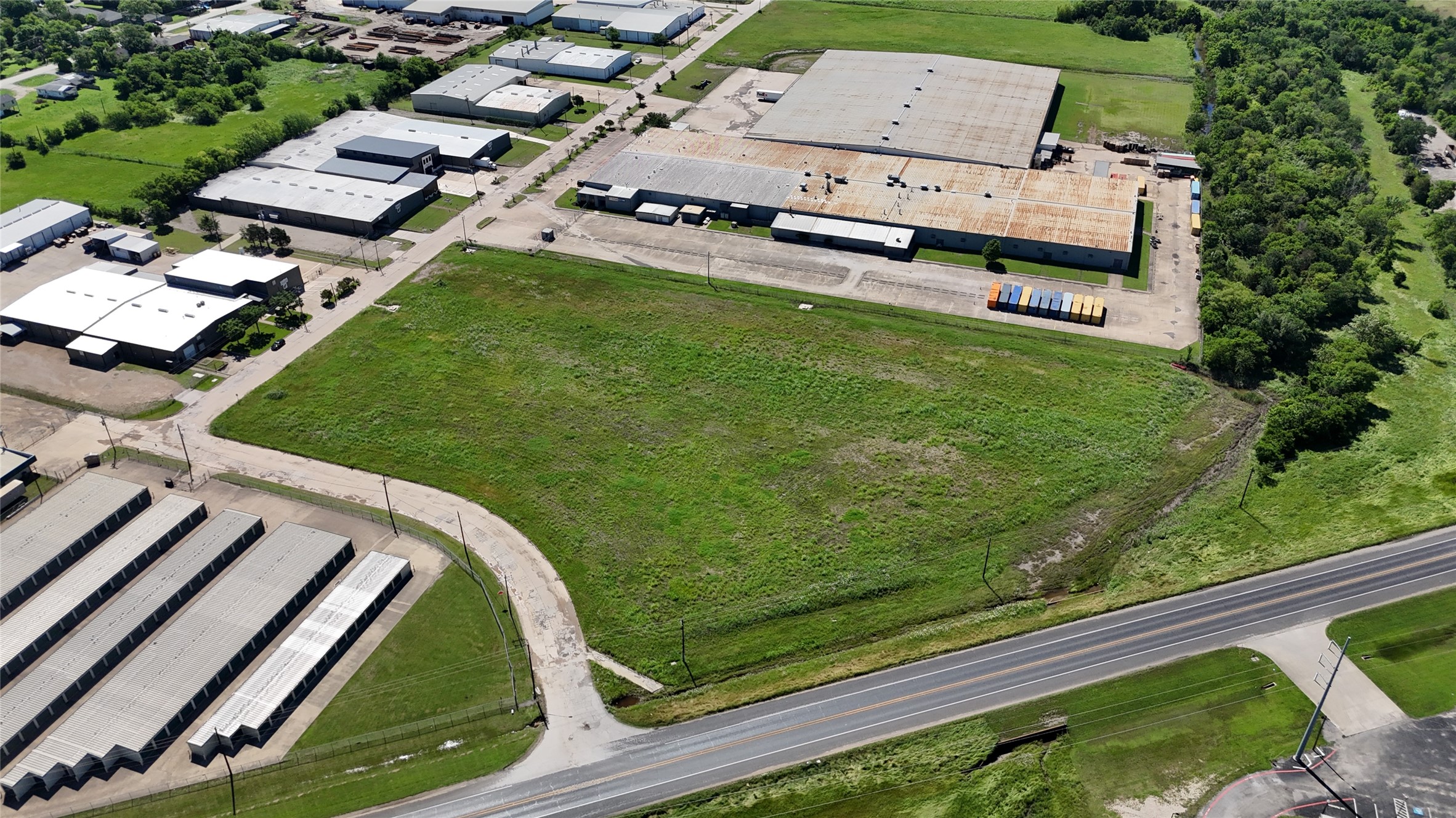 1401 Jack McKay Boulevard Ennis, TX 75119 - Photo 4 of 8 an aerial view of a tennis ground and a lots of trees