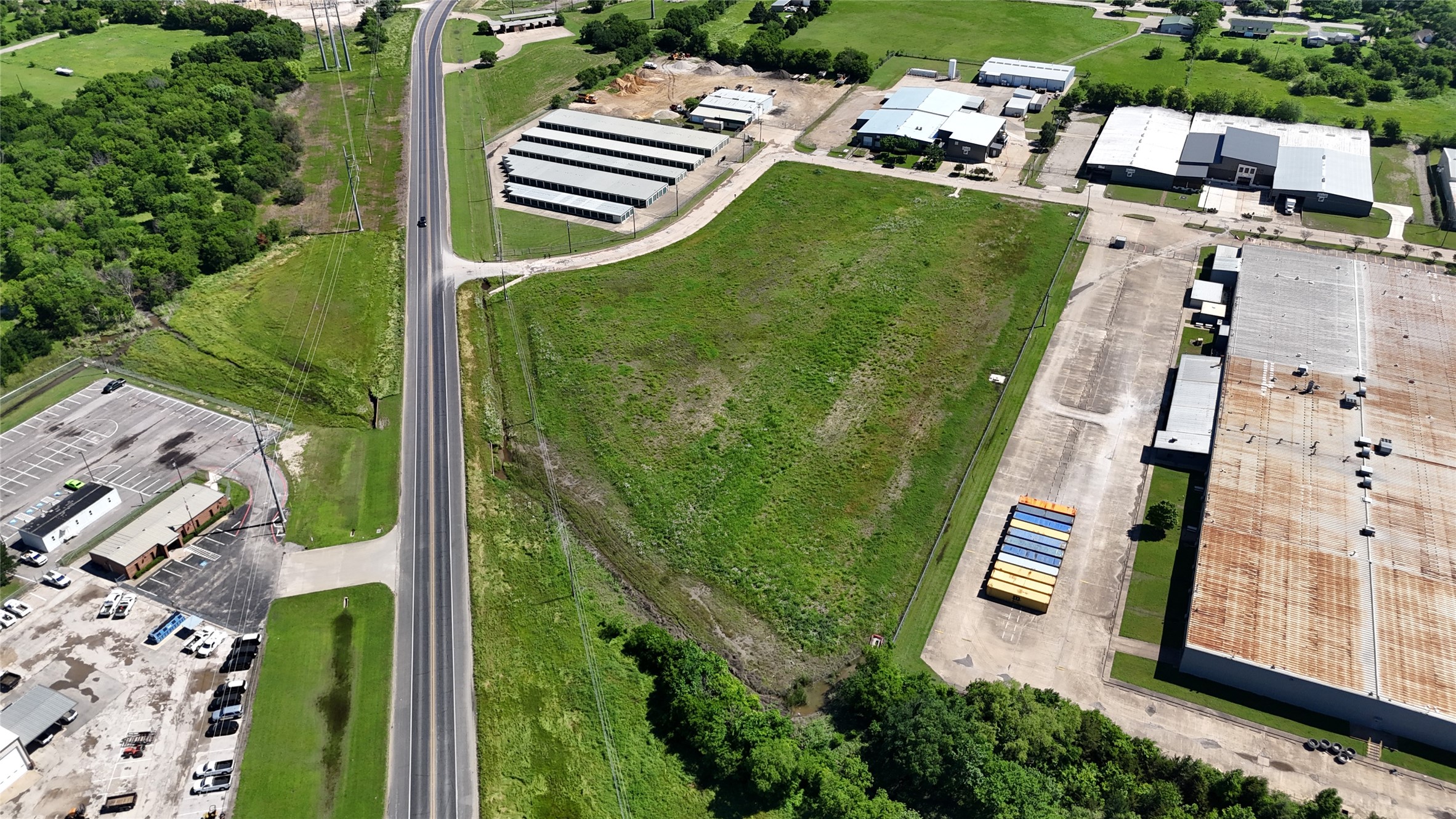 1401 Jack McKay Boulevard Ennis, TX 75119 - Photo 6 of 8 an aerial view of a residential houses with outdoor space